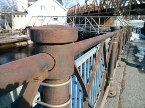 Rusty metal fence (detail)